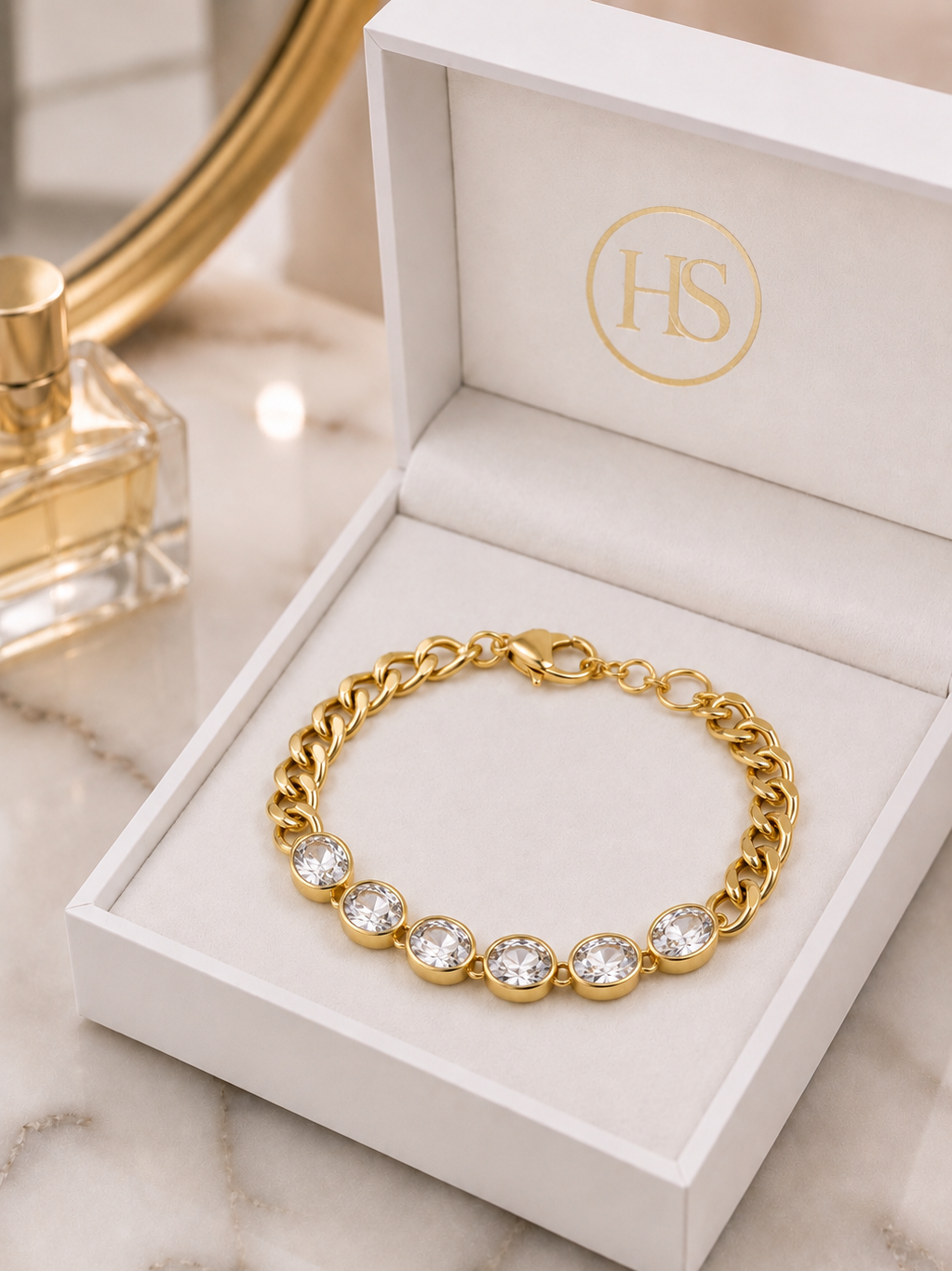 Dakota Bracelet in 14k gold plating with oval cubic zirconia stones and chunky cable link chain
