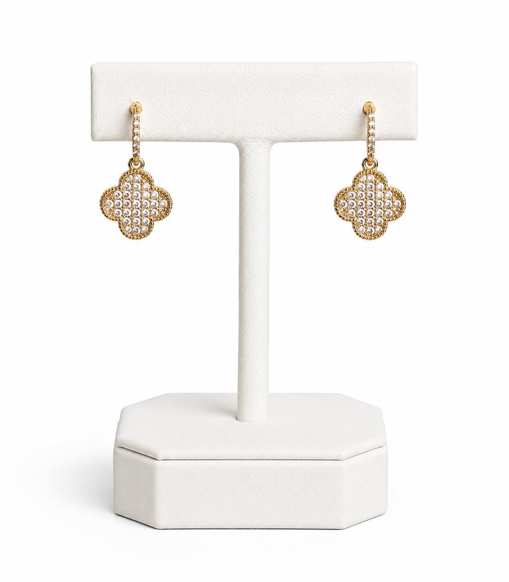 Lucky Clover Earrings featuring a 14k gold-plated clover drop design with pavé cubic zirconia crystals.