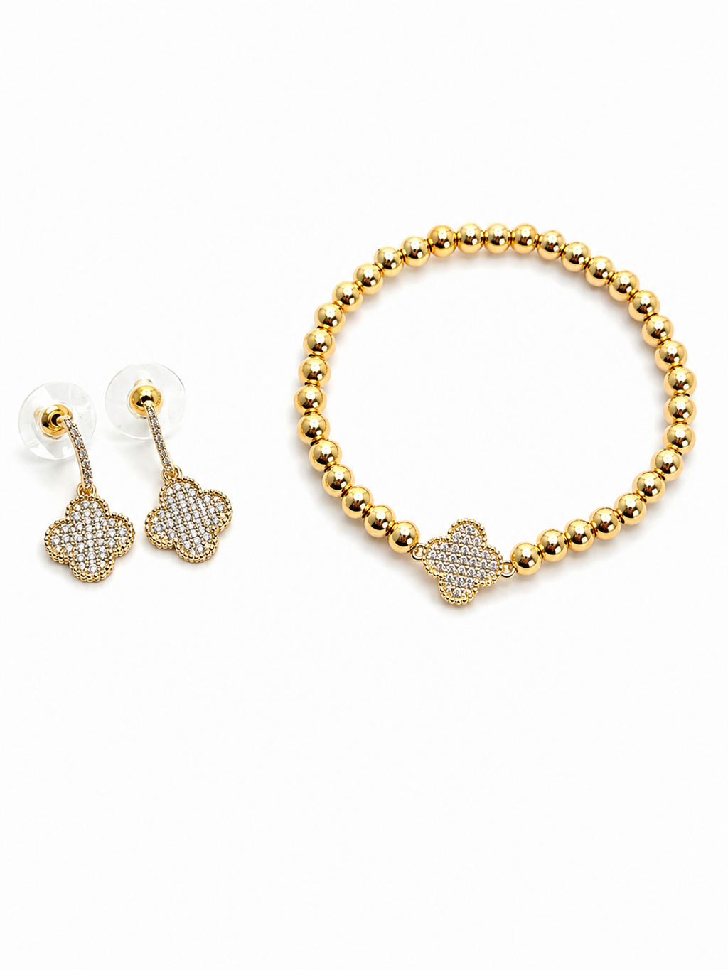 Lucky Clover Earrings paired with a matching clover bracelet in a 14k gold-plated finish.