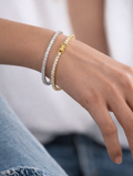 Gold and Rhodium plated tennis bracelets on model