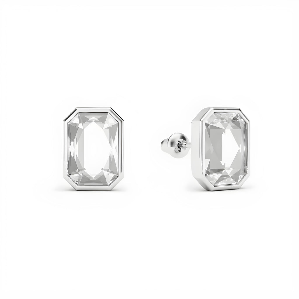 Pair of silver stud earrings with rectangular gemstones on a white background