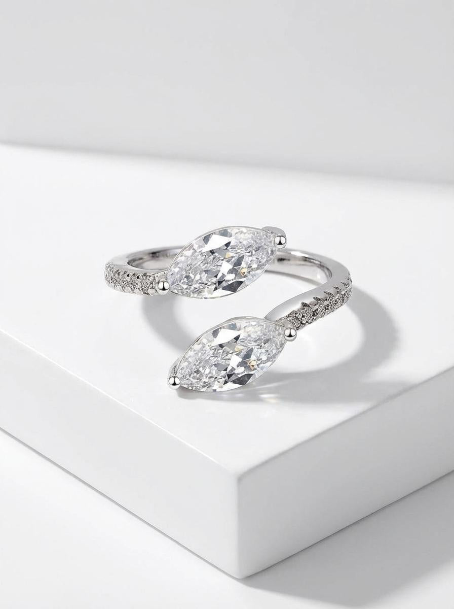 Vie ring with marquise cut clear stones set in sterling silver adjustable band