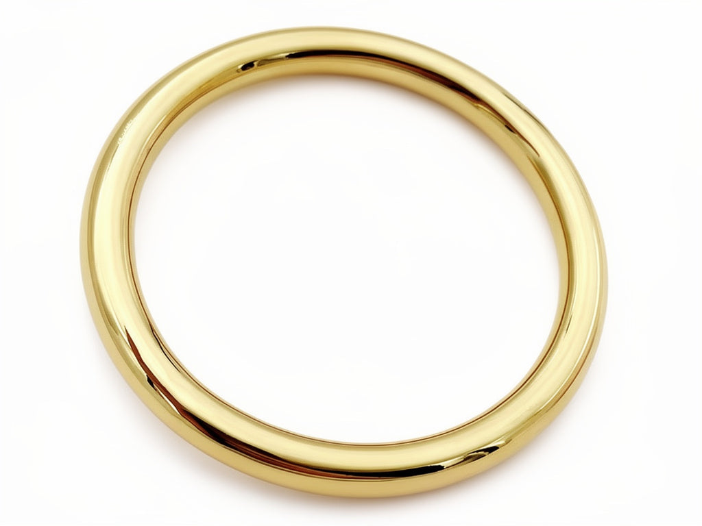 Minimal gold bangle bracelet with smooth polished finish