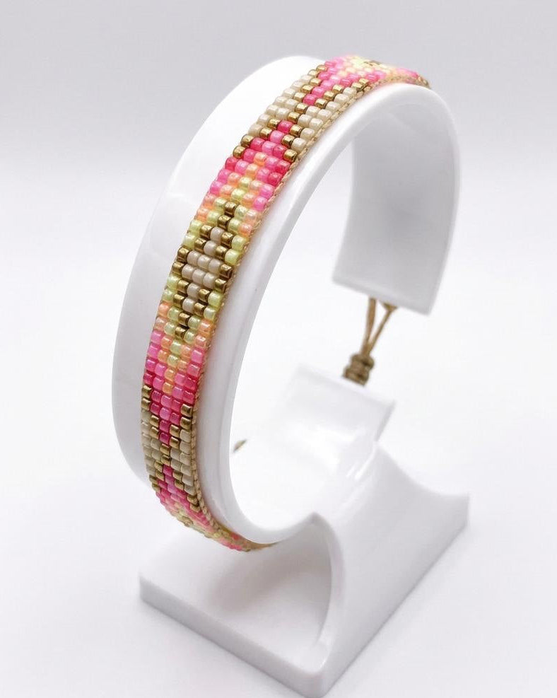 Adjustable Miyuki glass bead bracelet with woven geometric pattern, worn on wrist