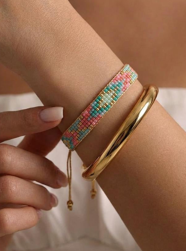 Layered Miyuki bead bracelet styled on model’s arm