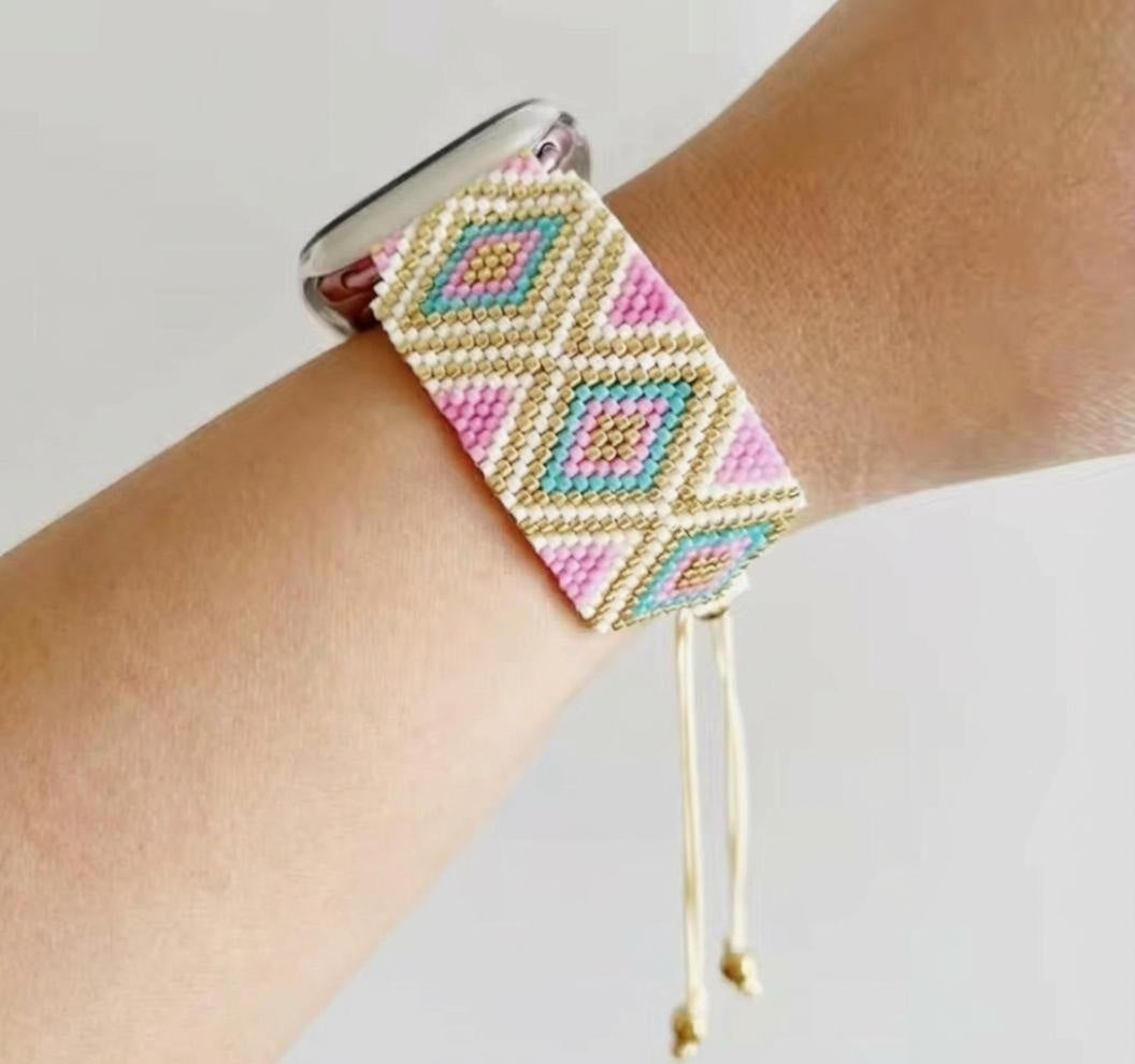 Miyuki bead smart watch strap with geometric pattern, worn on wrist