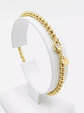 18K gold plated 925 sterling silver beaded chain bracelet on display stand