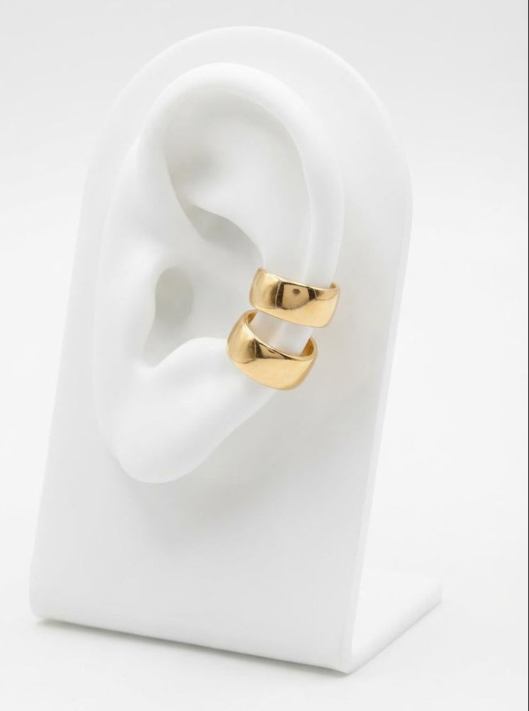 Close-up of gold-plated sterling silver ear cuff with polished finish
