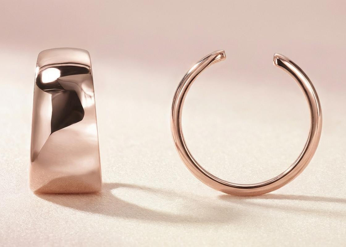 Close-up of rose gold-plated sterling silver ear cuff with polished finish