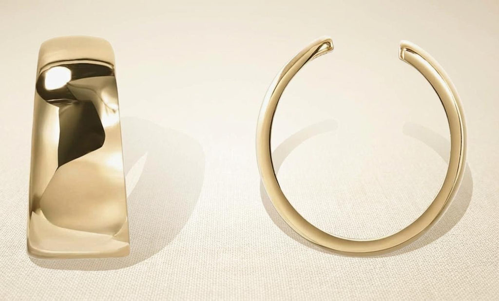 Close-up of gold-plated sterling silver ear cuff with polished finish