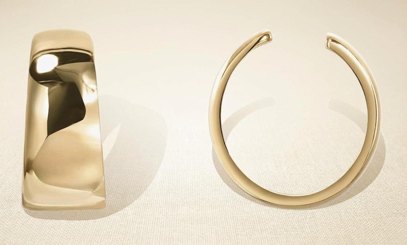 Close-up of gold-plated sterling silver ear cuff with polished finish