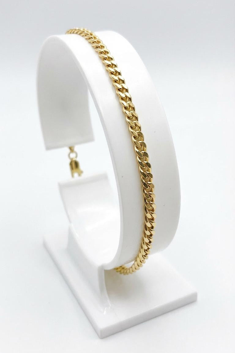 Gold tone minimalist curb chain bracelet with lobster clasp