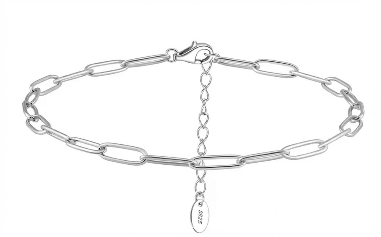 Silver chain bracelet with a clasp on a white background