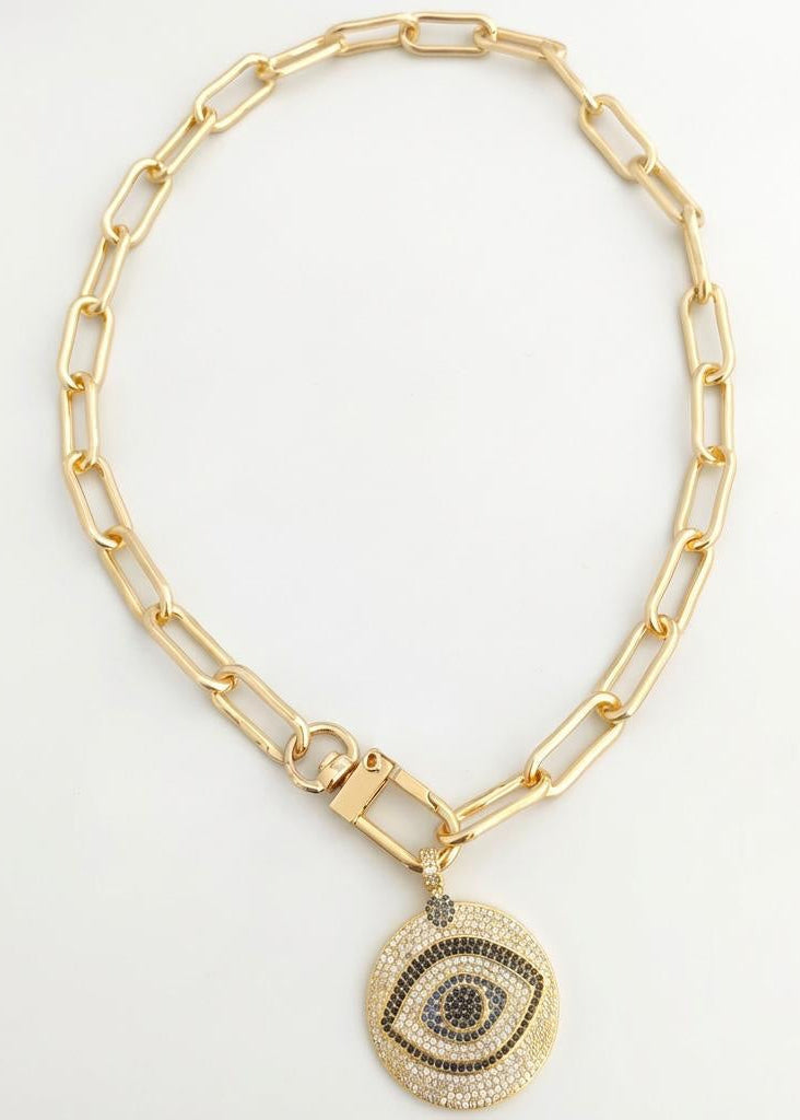 Gold chain necklace with an eye-shaped pendant