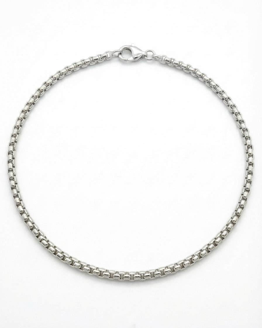 White Gold chain ankle bracelet on a white background