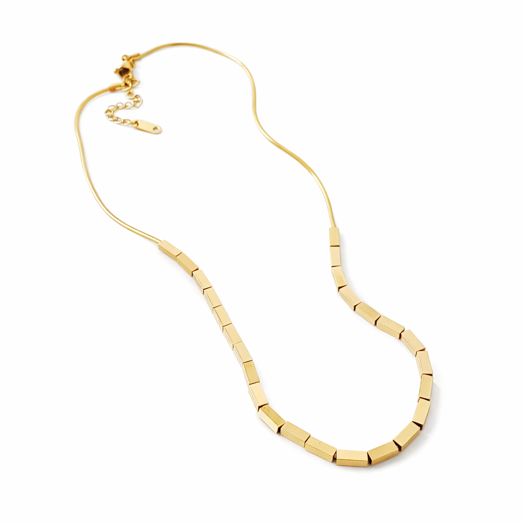 gold block chain necklace on display bust, chunky link chain, stainless steel 18k gold plated necklace