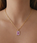 rectangular pink enamel pendant necklace on model, gold charm with cubic zirconia detail, 18k gold filled jewellery