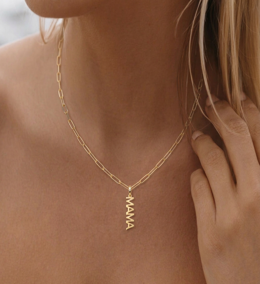 gold mama letter pendant necklace on model, dainty script charm necklace, 18k gold plated jewellery