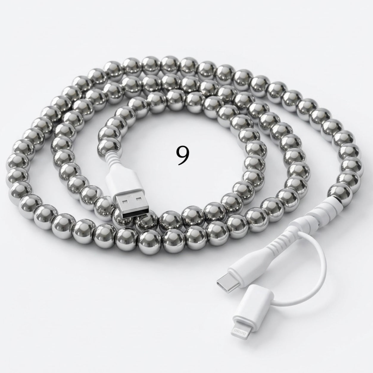 Silver beaded charging cable with USB connector and 2-in-1 Type-C and Lightning ends on white background