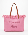 Pink tote bag with 'Summer Vibes' text and frayed edges on a white background