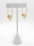  Gold hoop earrings with champagne crystal heart charm close-up